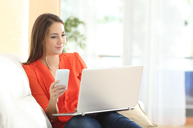 lady manager looking at laptop screen